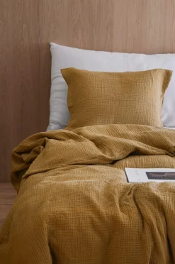 Outlet Ellos Home Sengesæt Candela i muslin, 2 eller 3 dele Brungul